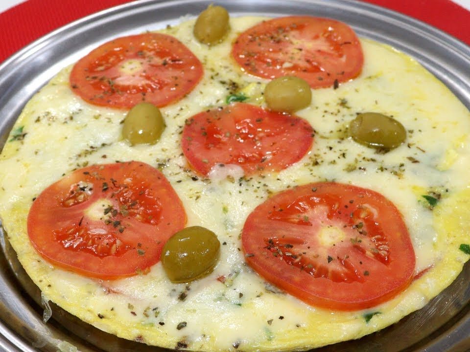 PARECE PIZZA, TEM GOSTO DE PIZZA MAS É OVOS COM TOMATE!