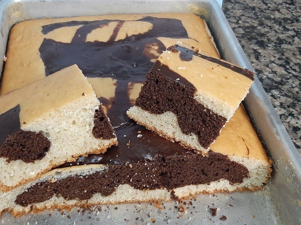 Bolo tamanho família, sabor mesclado massa muito leve e fofinho🥯🥯🥯🥯